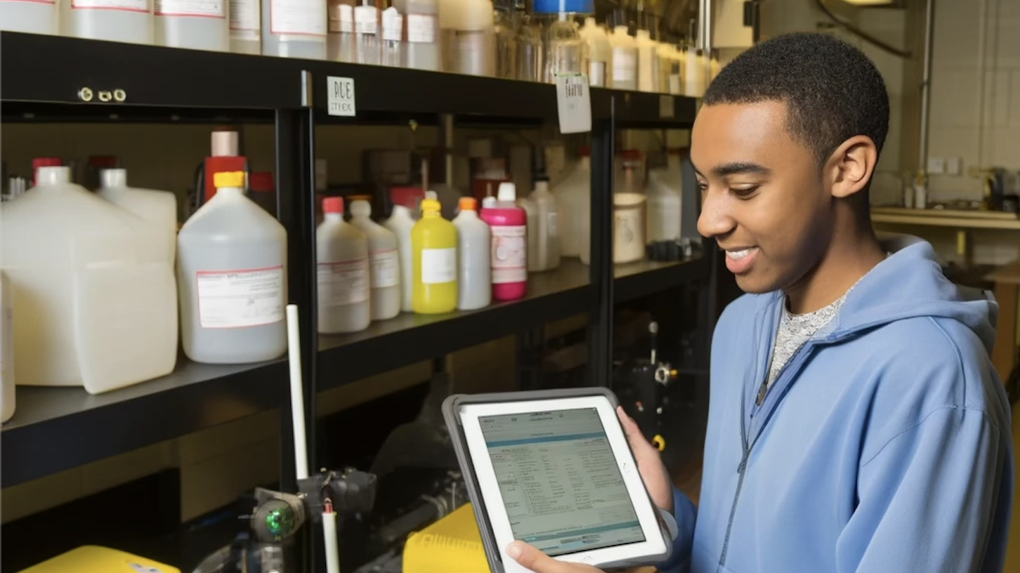 An image of a person working in a chemical stockroom